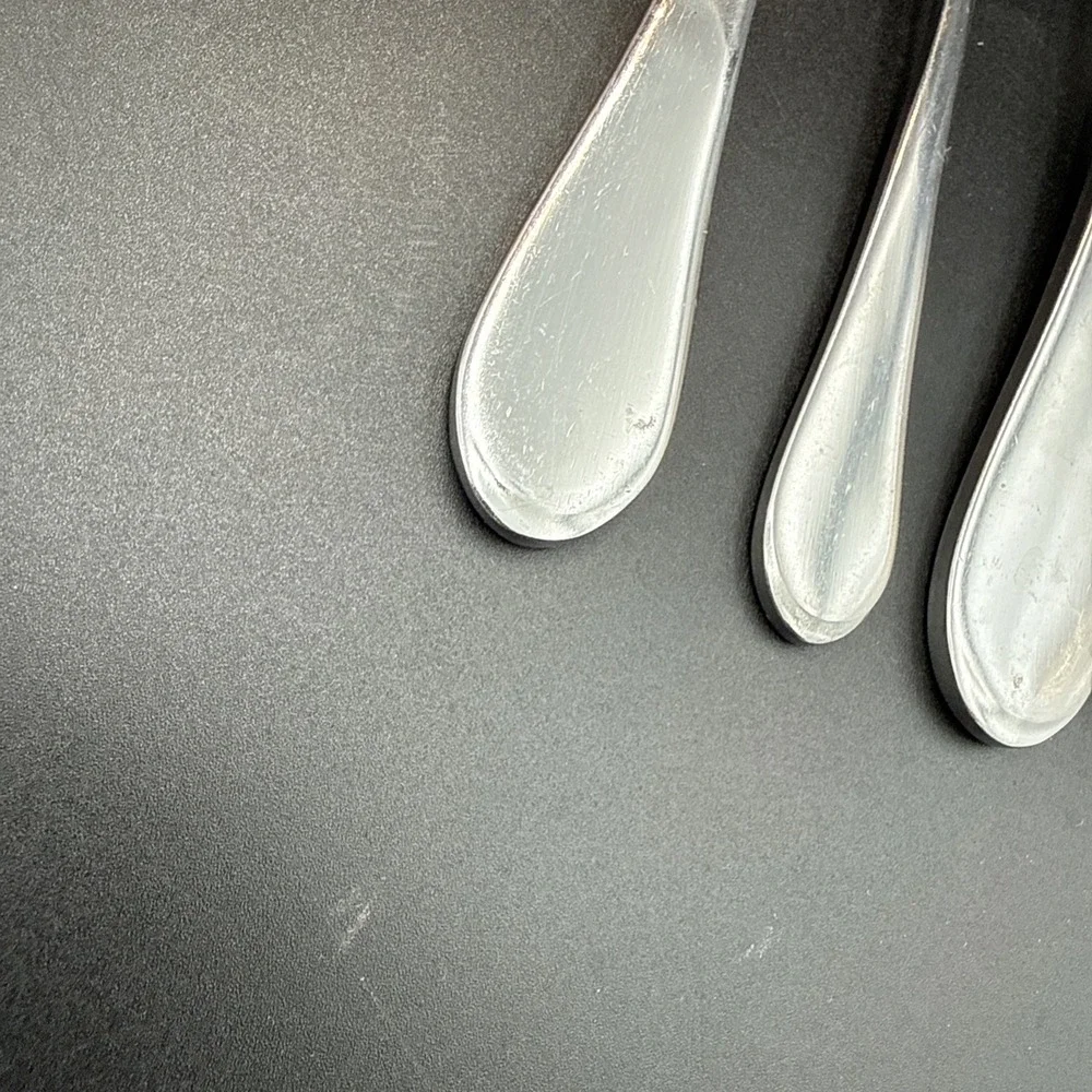 7 Piece Lot Oneida Icarus Glossy Stainless 4 Place Spoons 3 Teaspoons